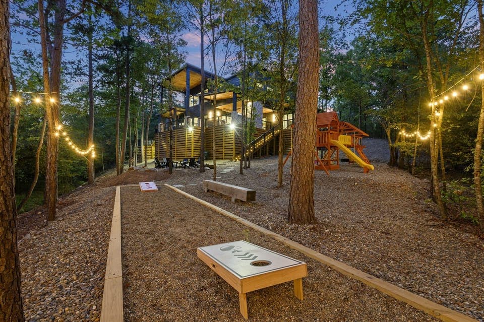 Outdoor Fun Zone: Delight in games and laughter under twinkling lights in nature's playground!