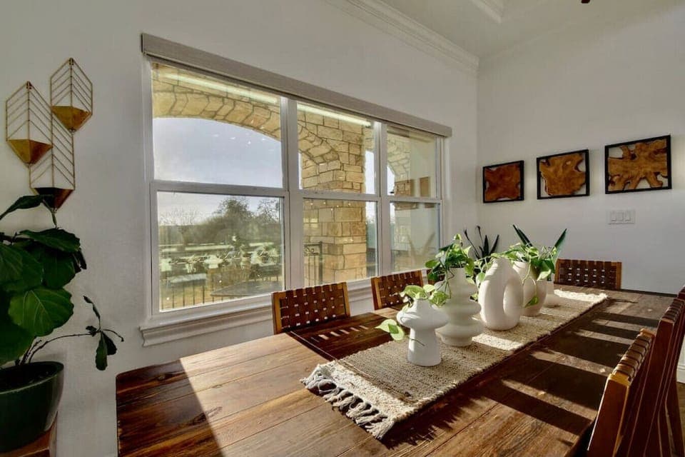 There are three dining spaces in the house: two are in the main living space and one is in the mother-in-law suite.