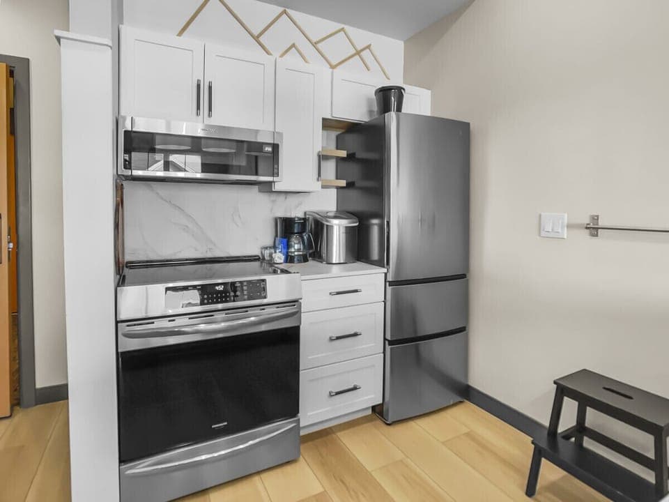 Fully equipped kitchen with stainless steel appliances
