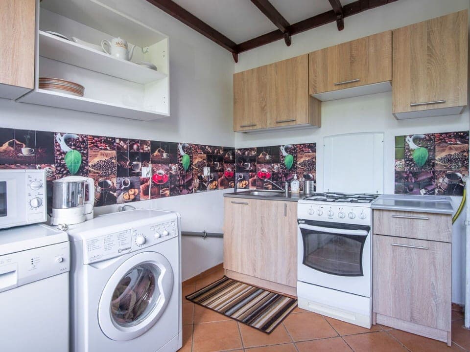 Laundry Room, Property, Clothes Dryer, Cabinetry, Washing Machine, Home Appliance, Interior Design, Laundry, Countertop, Kitchen Appliance