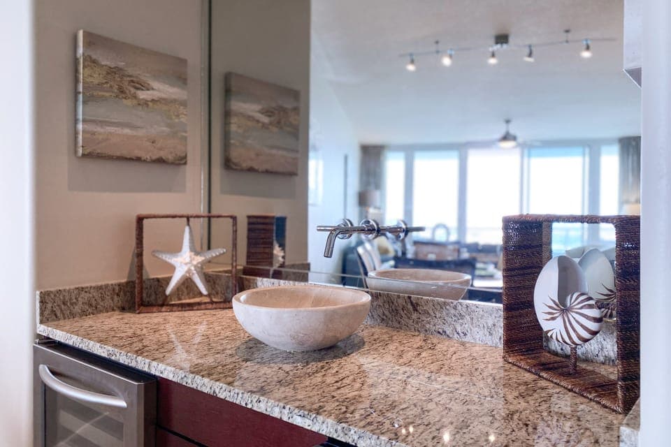 Elevate your entertaining experience with the convenience of this stylish wet bar. Perfect for crafting cocktails and keeping refreshments close at hand.
