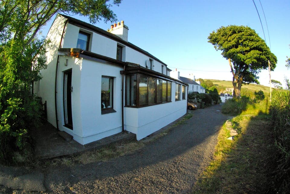 Front of the house, with parking opposite.