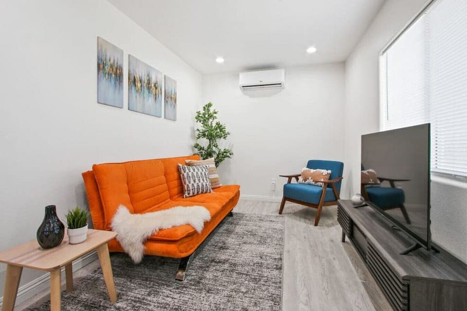 Unwind and relax in our comfortable living room with a 50` widescreen TV and HDMI cable for your entertainment needs.