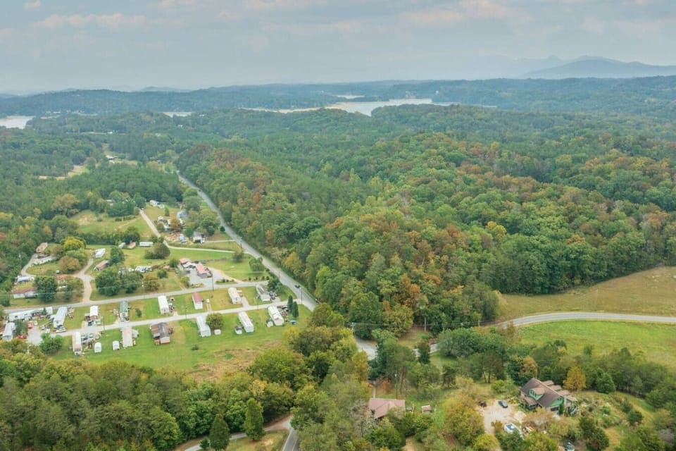 Aerial footage shows Douglas Lake in the background.