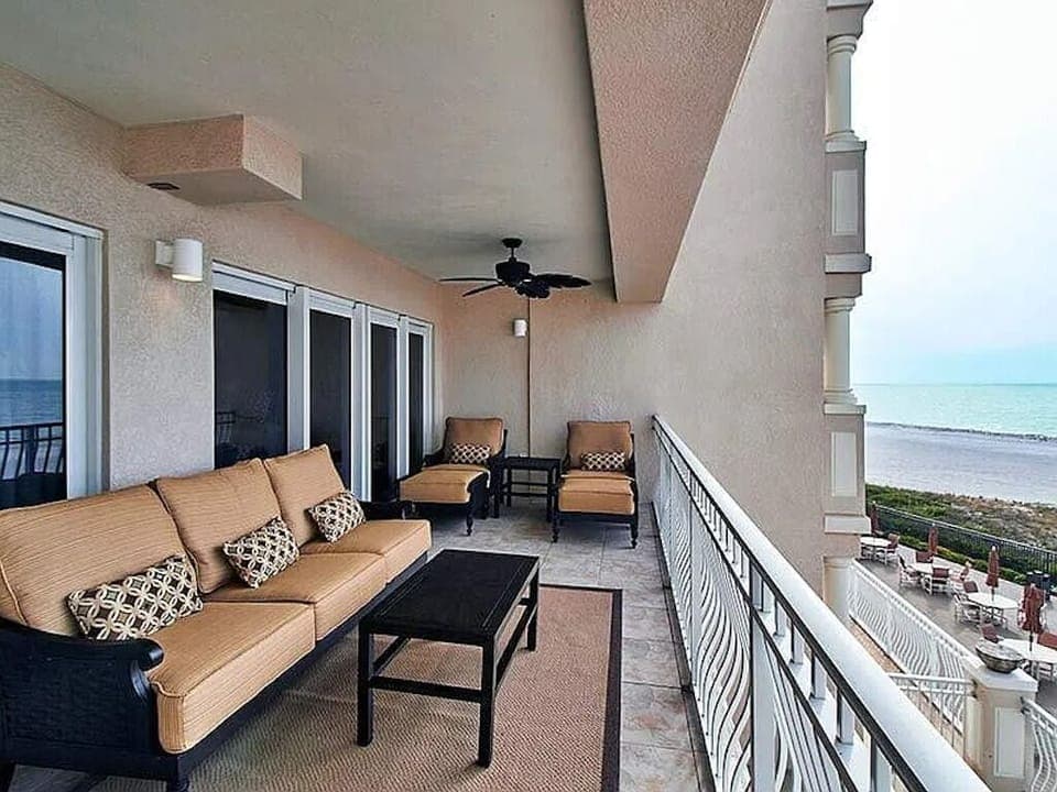 Upscale outdoor furniture with oversized cushions.