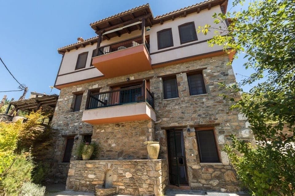 The main facade of the mansion,  with an unobstructed view of the sea