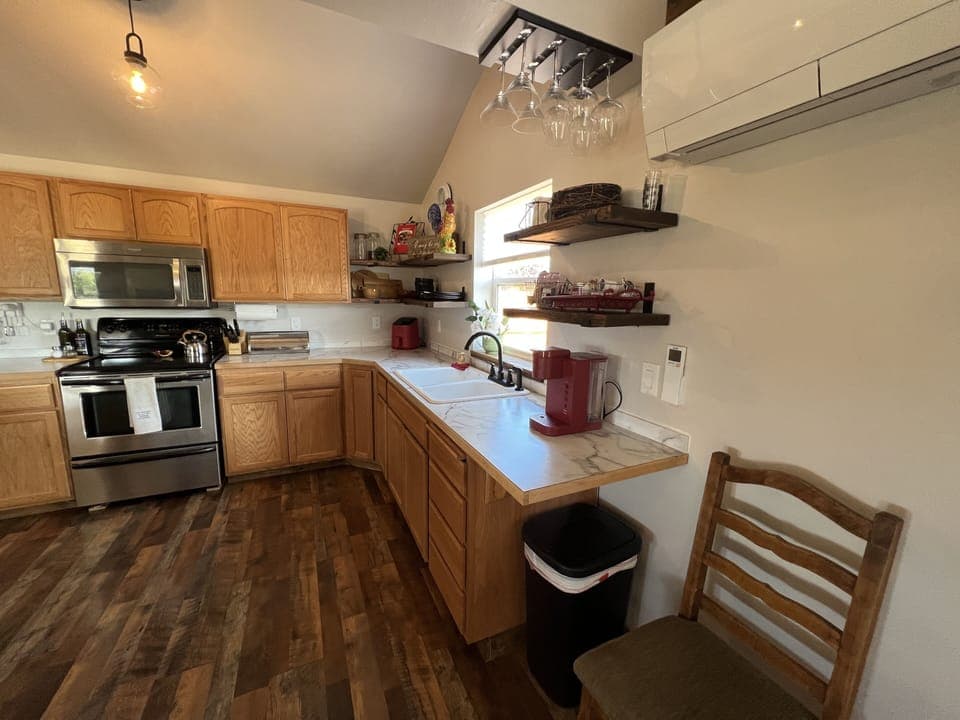 Kitchen is fully stocked with coffee and teas for morning start.