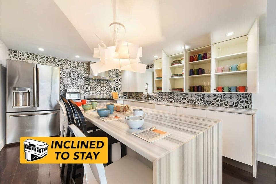 If the kitchen is too monochrome for you, just open any cabinet or drawer. Everything you need is here.