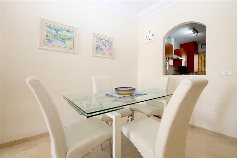Dining area for four guests next to the kitchen