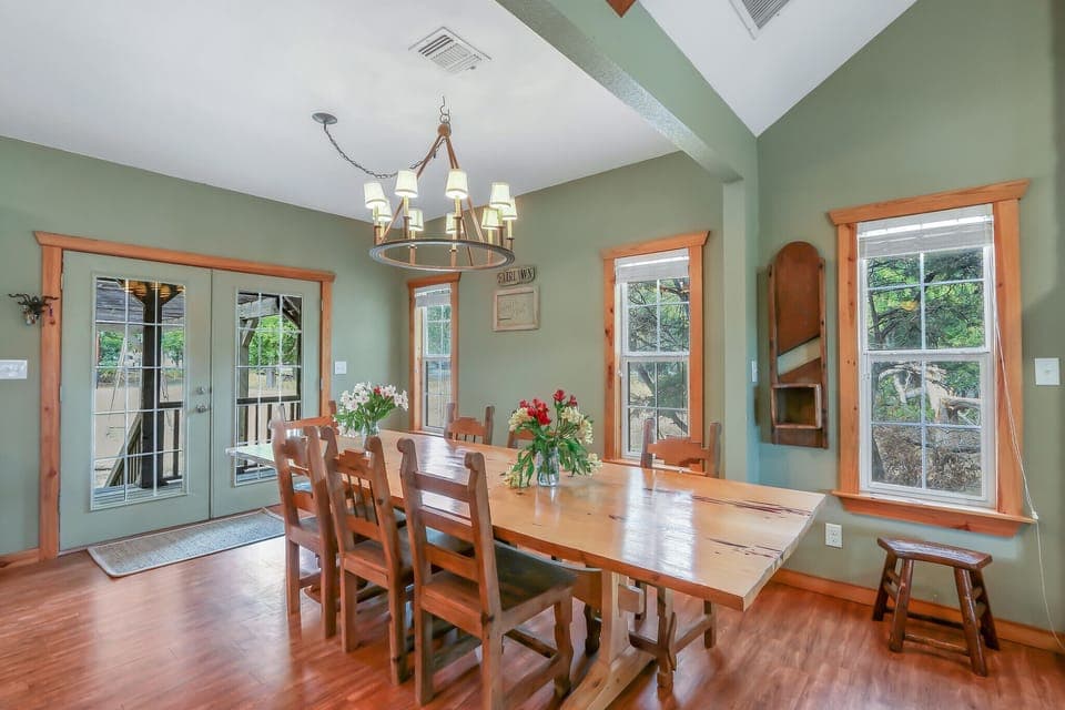 Grand dining table with plenty of room for guests to enjoy a meal together