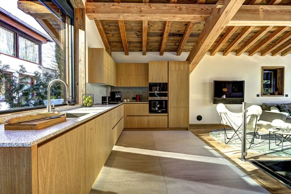 Stylish, well-equipped kitchen with stone worktops