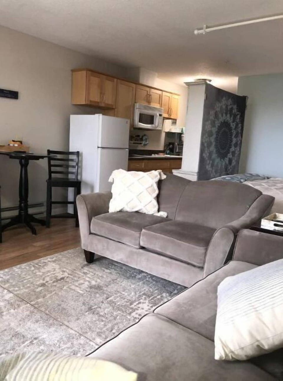 View of the kitchen,  no oven, there is a toaster,  air fryer, and toaster oven