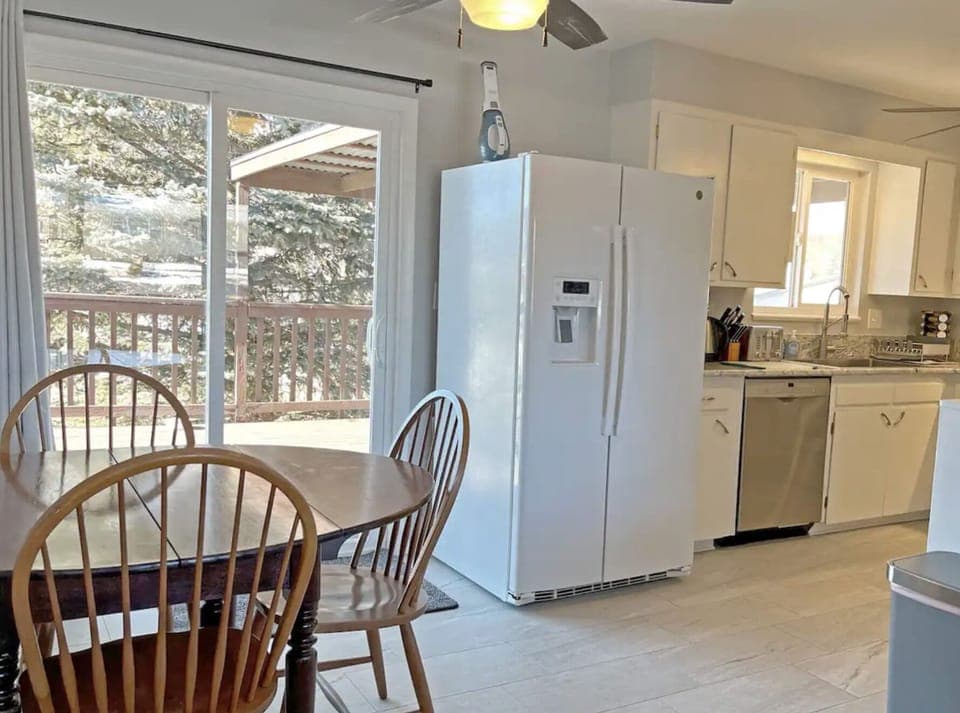 Kitchen with door to outside deck