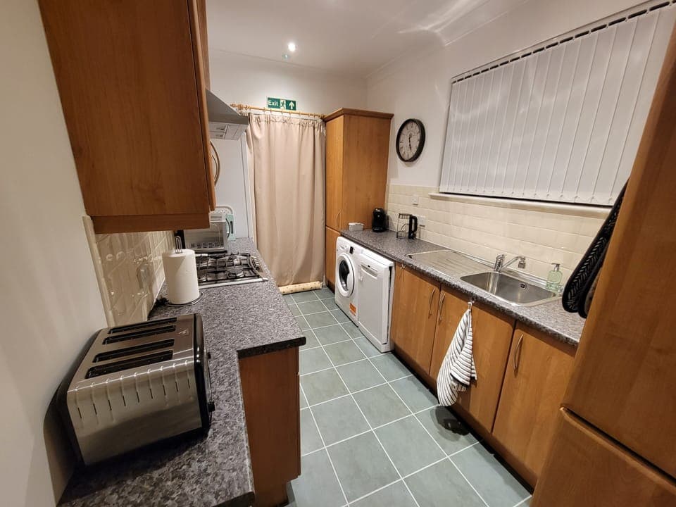 Well equipped galley kitchen