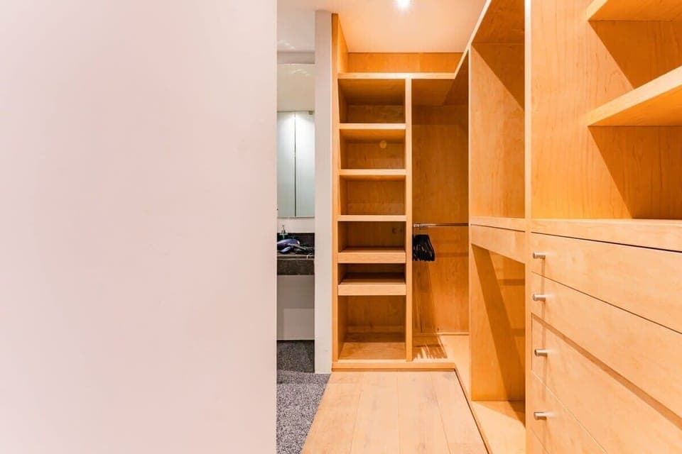 Walk in closet with plenty of storage space for all your outfits