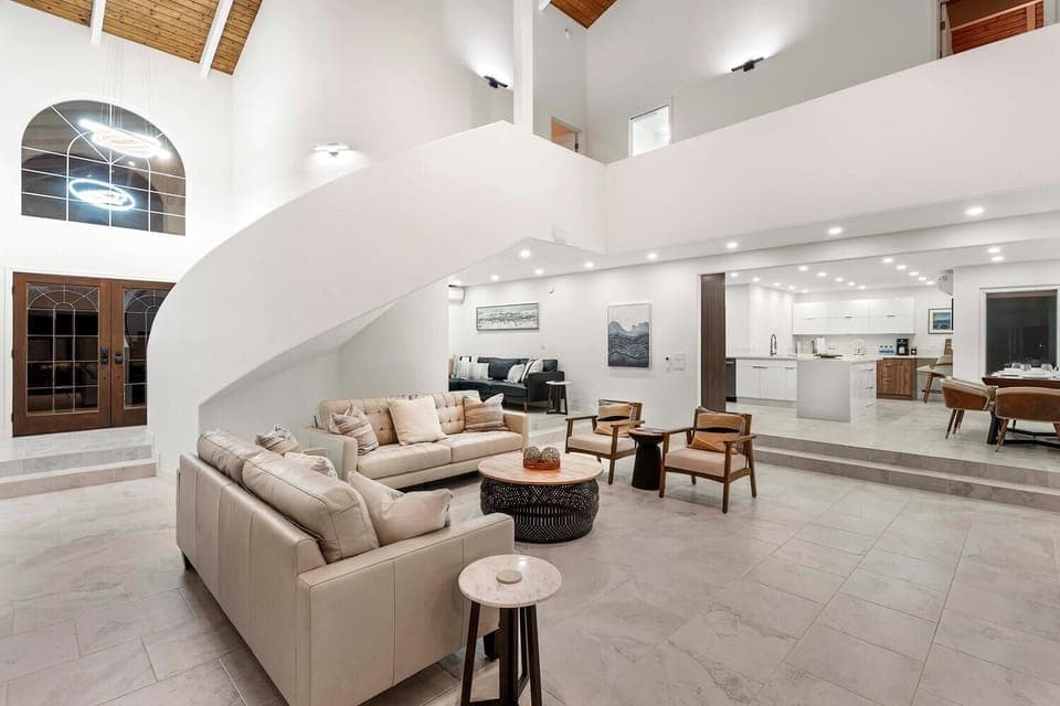 The open-concept living space invites bonding, with vaulted ceilings and relaxed, modern decor.