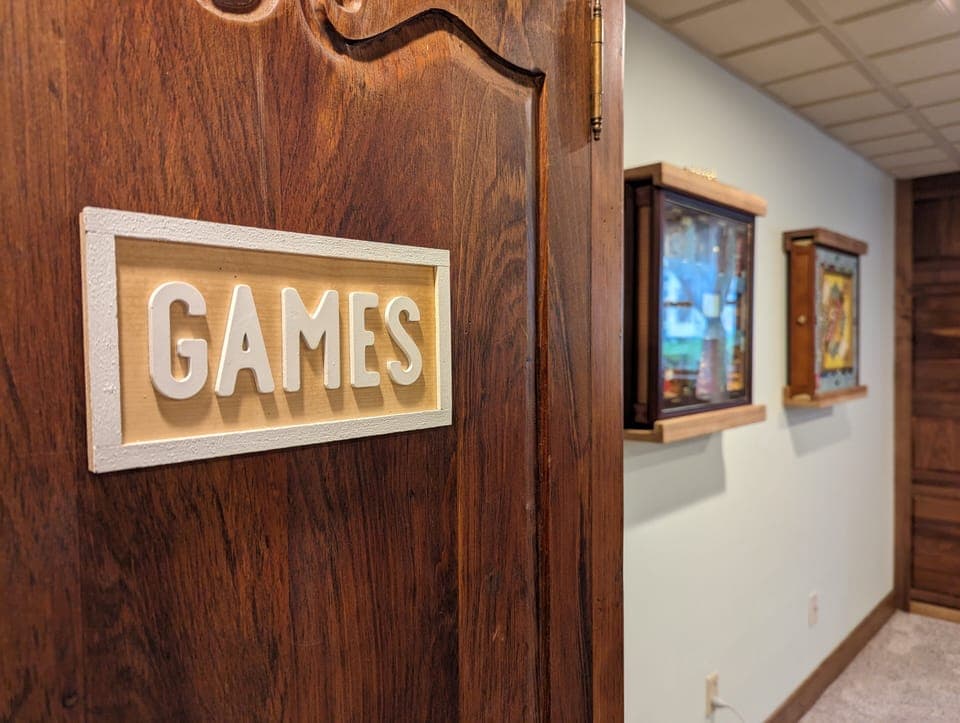 A stocked game closet for you to enjoy.