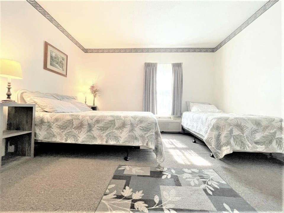 Spacious Room with Queen + Twin Beds