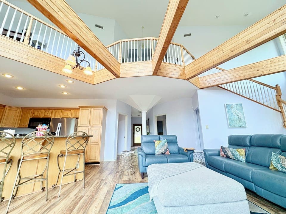 Wonderful main floor living room open to kitchen with breathtaking mountain view