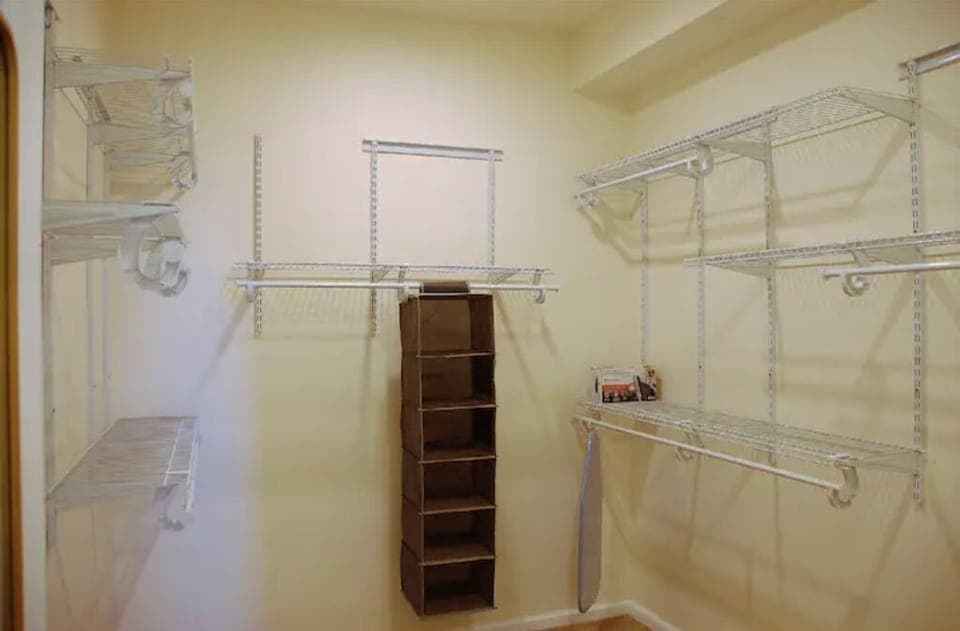 26. Walk-in closet (hers and his) in the master bedroom