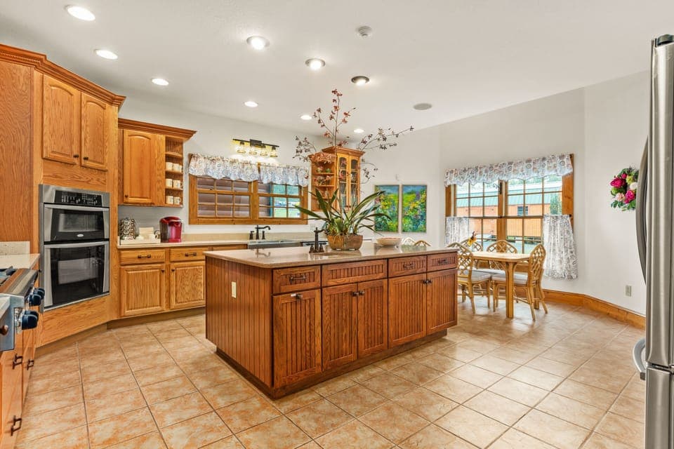 Fully stocked kitchen with pots, pans, plates, silverware and more. 