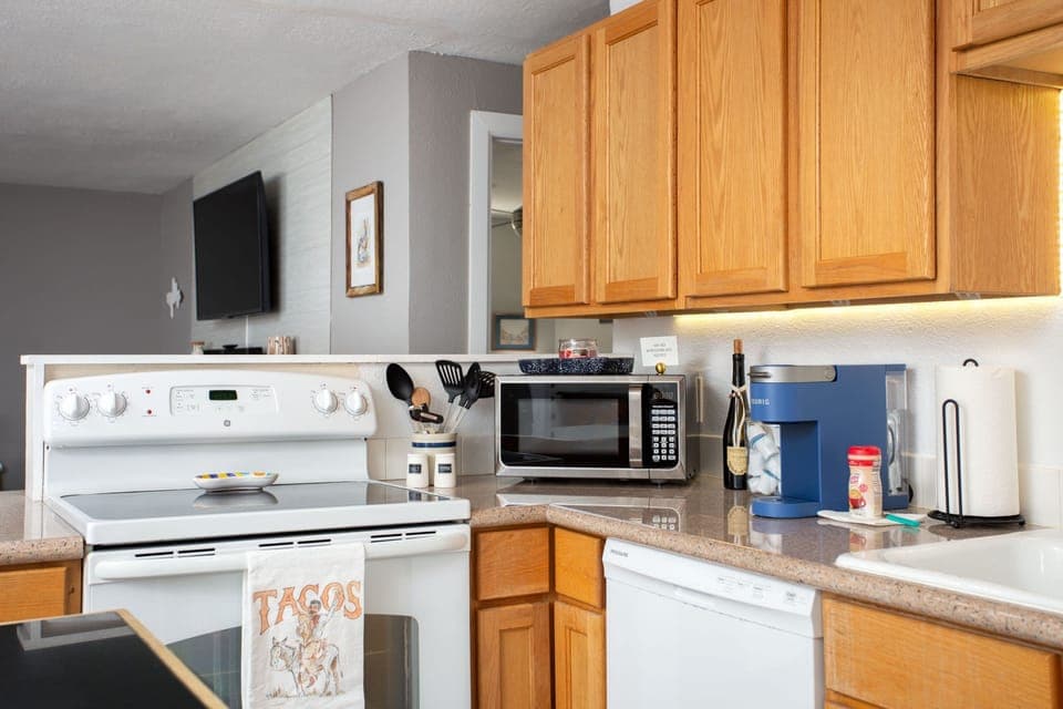 Stove/oven, microwave, K-Cups, toaster, D/W, pantry items.