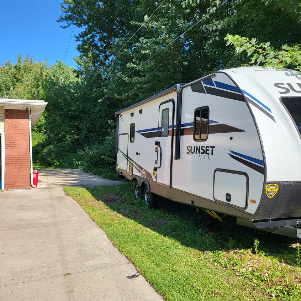 Guest Parking behind trailer on concrete pad