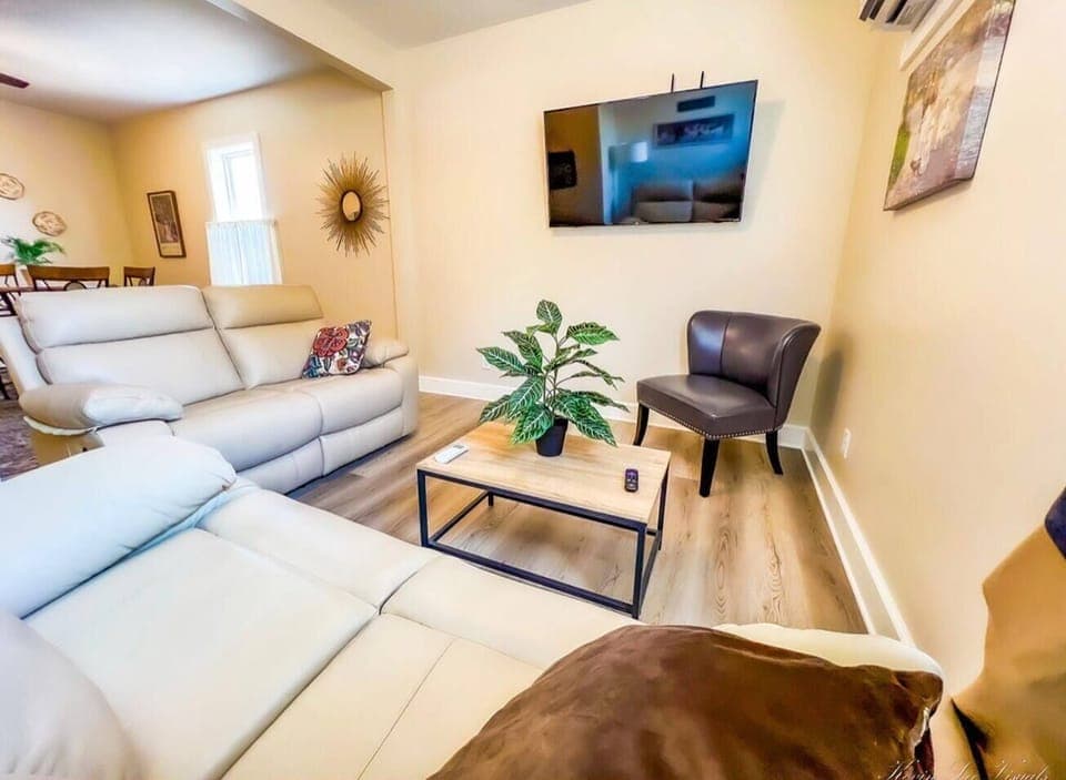 2 leather reclining couches, personal comfort for watching 55" smart tv