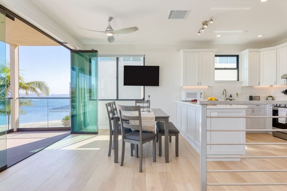 Additional TV near the dining area.