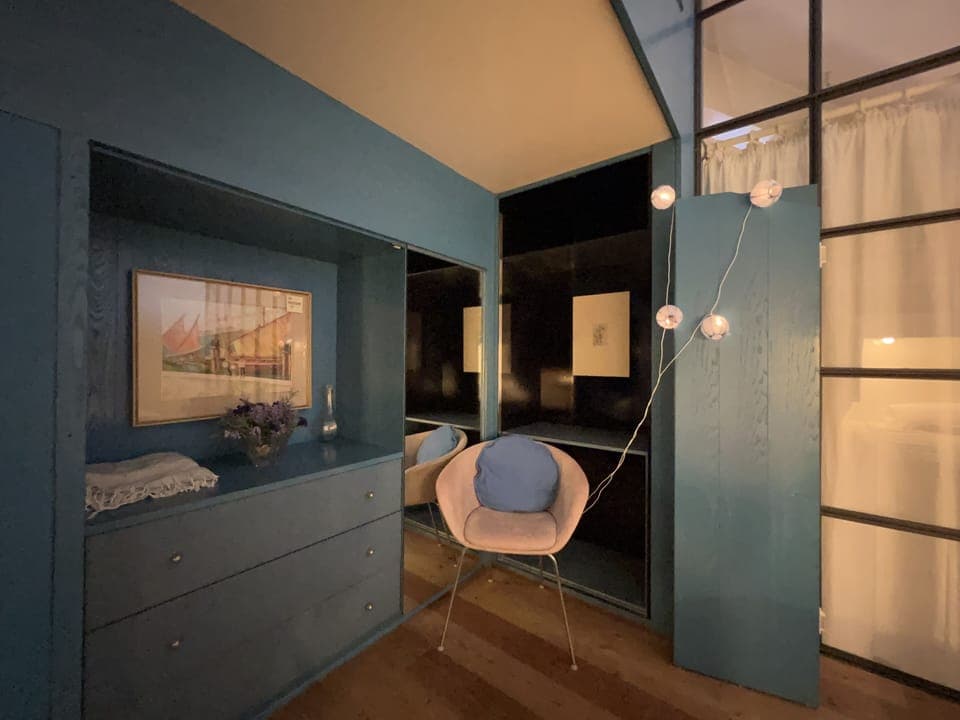 A table in the main bedroom for reading or relaxing 