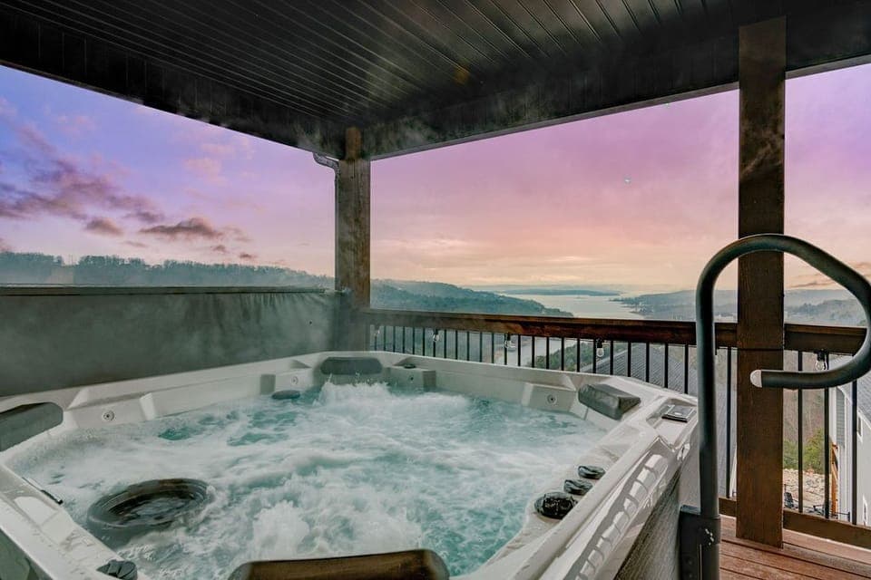 Hot tub located on Second Floor Deck, overseeing Table Rock Lake. 5 fit easily.