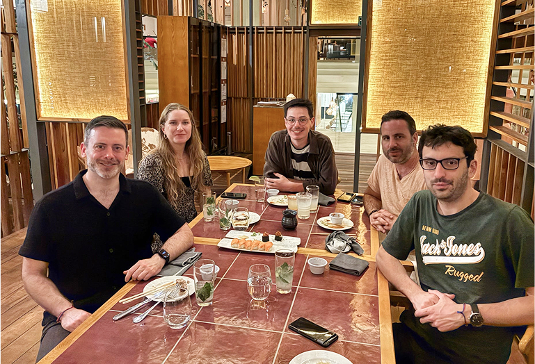 People around table at dinner